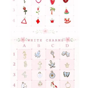 May include: A selection of silver alphabet charms and themed charms, including pink, red, white, miscellaneous, and ocean-themed designs. The charms are displayed on a pink background with floral accents. The charms include letters, hearts, and other shapes.