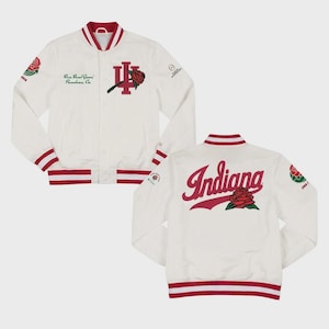May include: White satin jacket with red and white striped trim. Features the word "Indiana" in red script on the back, along with a rose graphic. The front has a rose graphic and the text "Rose Bowl Game Pasadena, Ca."
