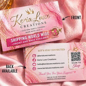 May include: Pink and gold business cards with the text "Keria Luxe Creations" and "Custom Party Favors". The front card reads "Shipping World Wide". The back card has social media icons and a QR code to shop.