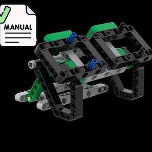 May include: A complex black, green, and gray construction, possibly a model or a component of a larger system. The structure features interlocking pieces, with blue and green accents. A white document with the word "MANUAL" is in the upper left corner.