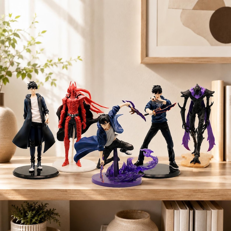 May include: A collection of five anime-style character figures displayed on a wooden surface. The set includes figures in various poses, featuring a red armored knight, a dark creature with purple accents, and three human figures in casual attire.