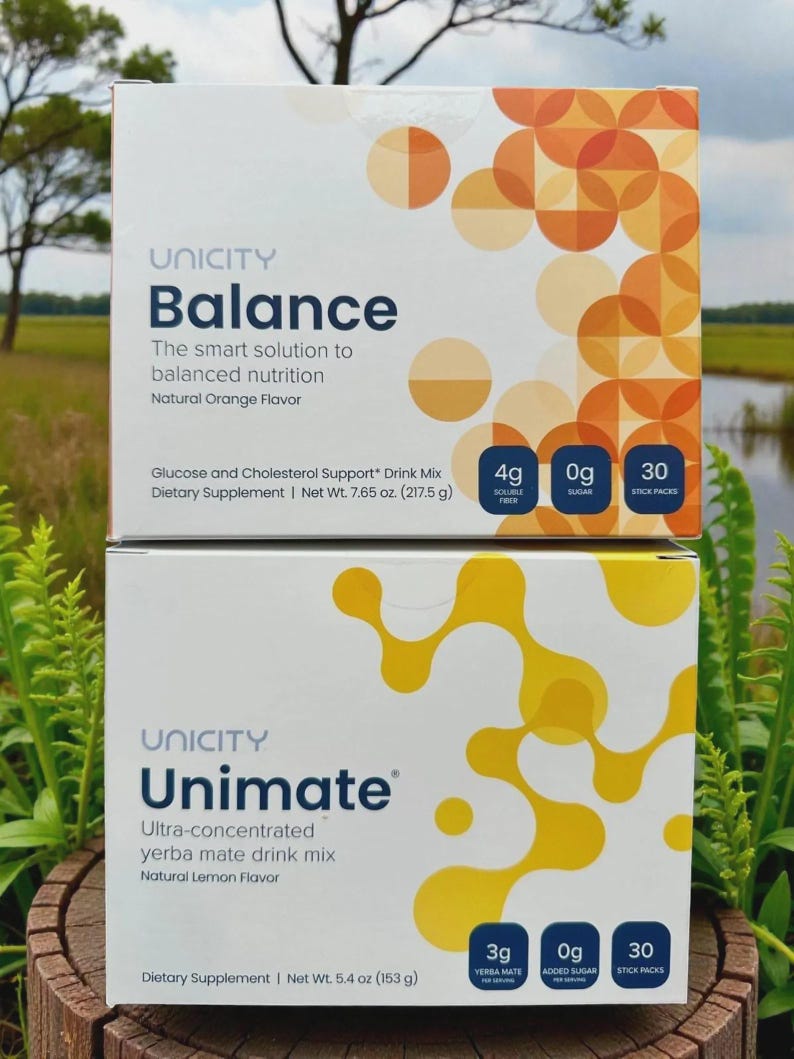 May include: Two rectangular boxes of Unicity dietary supplements stacked vertically. The top box is Balance with orange circular patterns, 4g soluble fibre, 0g sugar, and 30 stick packs. The bottom box is Unimate with yellow organic shapes, 3g yerba mate, 0g added sugar, and 30 stick packs.