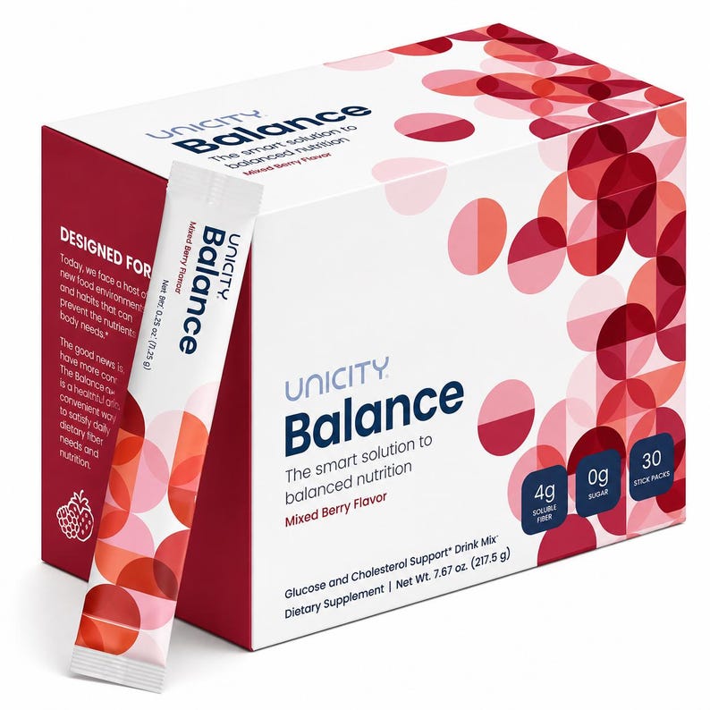 May include: A white and dark red box of Unicity Balance dietary supplement with a matching single stick pack. The packaging features a geometric circle pattern, text stating 4g soluble fibre, 0g sugar, 30 stick packs, and a net weight of 217.5 g.