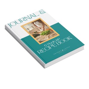 May include: A recipe book titled "Journal & Recipe Book" with a teal and white cover. The book features an image of someone preparing food. The text "6-Month AIP" is displayed on the cover, along with the author's name.