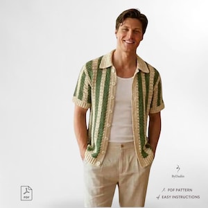 May include: A cream and green striped, short-sleeved shirt with a button-down front and collar. The shirt is made of a crocheted material. The image also includes the text "By Dadin", "PDF Pattern", and "Easy Instructions".