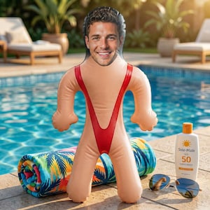 May include: An inflatable doll with a custom printed face of a smiling person, wearing a red one-piece swimsuit. The doll is positioned near a rolled-up colorful patterned beach towel, a bottle of Sole-Mate SPF 50 sunscreen, and sunglasses.