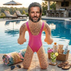 May include: An inflatable pool float shaped like a person with a printed face of a bearded individual, wearing a pink one-piece swimsuit. The float features printed dark hair on the chest, arms, and legs, standing upright on a pool deck.