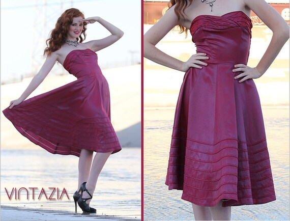Vintage 1950s full swing dress with rainbow stripes in chevron style pattern dolman sleeve