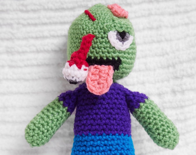 Crochet Zombie Doll with purple shirt
