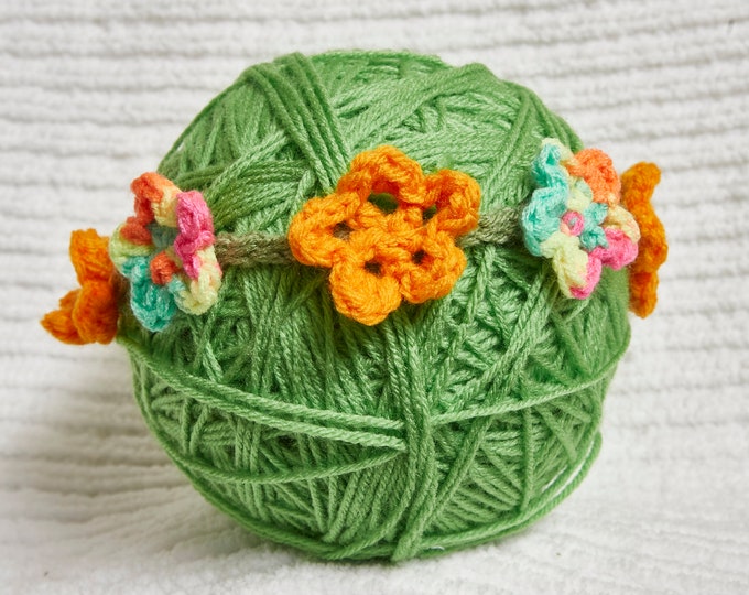 Daisy Chain headband crochet headband with orange and multicolored flowers stretchy headband