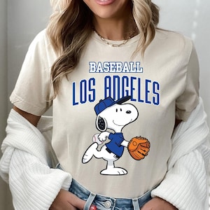 May include: A handmade wooden sign with the text "Welcome to our home" in a handwritten style. The sign is painted white with black lettering and a distressed finish, perfect for home decor.