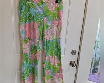 Pantalones acampanados de algodón con estampado floral verde y rosa de Lilly Pulitzer