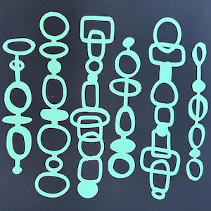 May include: A set of six vertical chains in mint green against a dark charcoal background. Each chain consists of a unique arrangement of interconnected geometric shapes, including circles, ovals, and rounded rectangles, creating a repeating pattern.