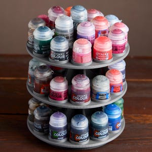 May include: A handmade wooden sign with the text "Welcome" in a playful font. The sign features a distressed finish and a simple, rustic design, perfect for a front door or entryway.