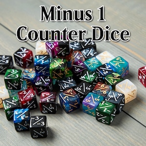 May include: A collection of multi-colored counter dice with the text "Minus 1 Counter Dice". The dice are various colors including red, green, blue, and black, with white numbering. The dice are used for tabletop gaming.