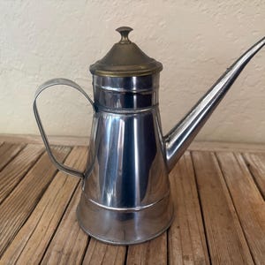 May include: A rustic wooden sign with the text "Welcome to our home" in white lettering. The sign features a distressed finish and a simple, inviting design, perfect for a front porch or entryway.