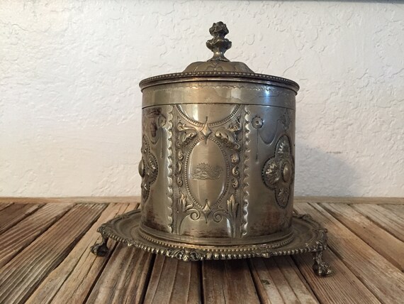 Antique Silver Embossed Canister