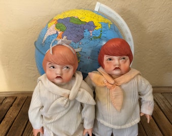 Vintage Pair of Porcelain Dolls