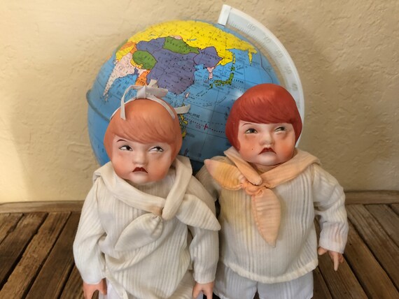Vintage Pair of Porcelain Dolls