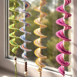 May include: A white ceramic mug with a black handle and the text "But First, Coffee" in a black, bold font. The mug is on a white surface.