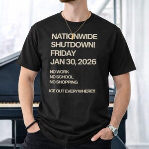 May include: Black t-shirt with the text "NATIONWIDE SHUTDOWN! FRIDAY JAN 30, 2026" in a bold, sans-serif font. The text below reads "NO WORK, NO SCHOOL, NO SHOPPING, ICE OUT EVERYWHERE!!!"