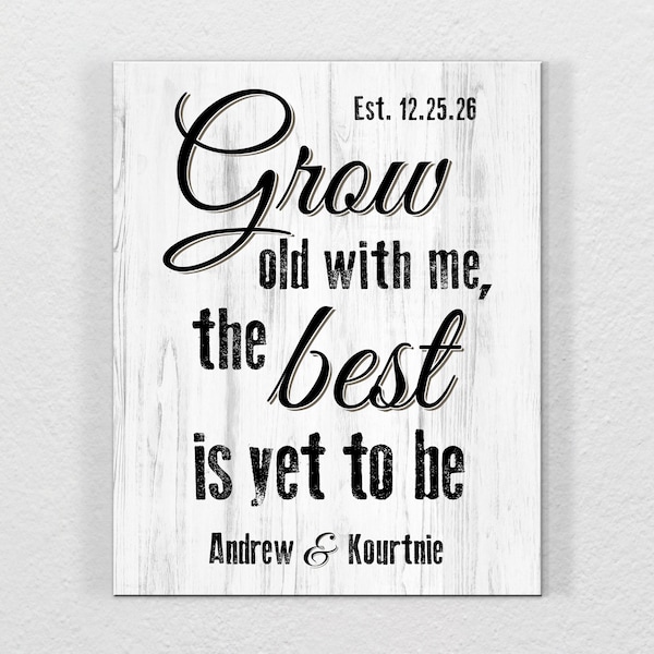 May include: A white wood sign with black text that reads "Est. 12.25.26 Grow old with me, the best is yet to be Andrew & Kourtnie".