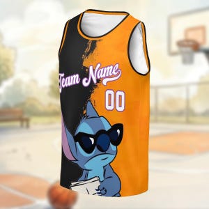 A basketball jersey with a cartoon character on it, featuring a black and orange color scheme.