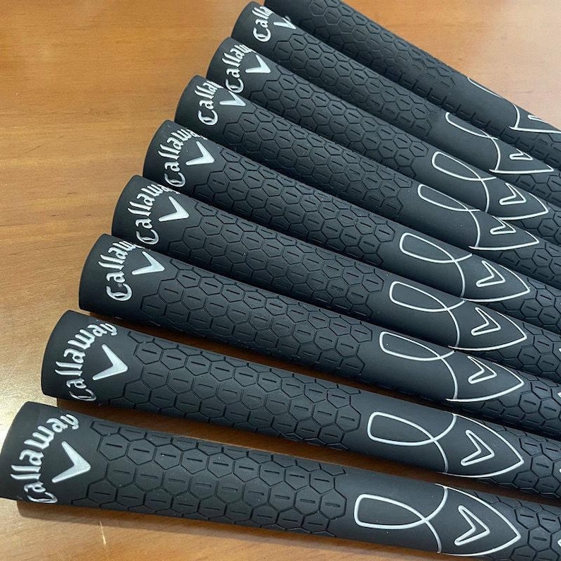 May include: A set of three ceramic mugs with a speckled, matte finish. The mugs are in shades of cream, light gray, and dark gray. Each mug has a simple, minimalist design, perfect for coffee or tea.