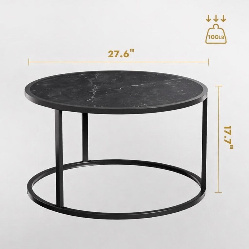 May include: Round black marble-top coffee table with a black metal frame. The table is 27.6 inches in diameter and 17.7 inches high. The table can hold up to 100 pounds.