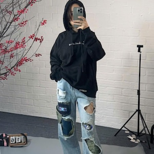 Rekonstruerade patchworkjeans för kvinnor
