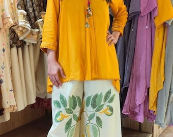 Conjunto de algodón coordinado, pantalones palazzo estampados, túnica de verano de corte holgado.
