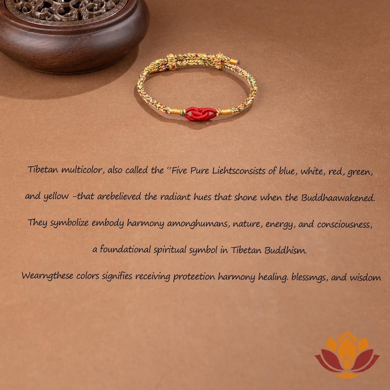 May include: A gold-colored bracelet with a red knot in the center. The bracelet is made of woven material and has a decorative design. The image also includes text about Tibetan Buddhism and the symbolism of colors.