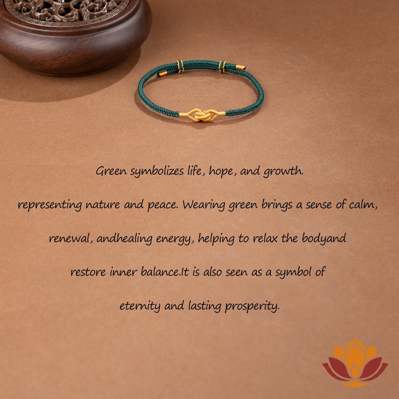 May include: A green bracelet with a gold knot design. The bracelet is made of a woven green material with gold accents. The text in the image says "Green symbolizes life, hope, and growth."