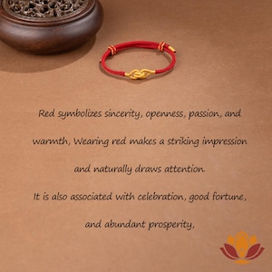 May include: A red bracelet with a gold-colored knot design. The bracelet is made of a woven red cord. The image also includes text that says "Red symbolizes sincerity, openness, passion, and warmth."