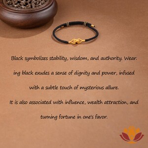 May include: A black bracelet with gold accents and a knot design. The bracelet is on a brown surface. Text on the image reads: Black symbolizes stability, wisdom, and authority. Wear. It is also associated with influence, wealth attraction, and turning fortune in one's favor.