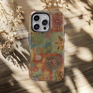 May include: A colorful phone case with a vintage, bohemian design. The case features a collage of suns, figures, and floral patterns in shades of orange, green, and brown. Text on the case reads "The Hippies I knew".