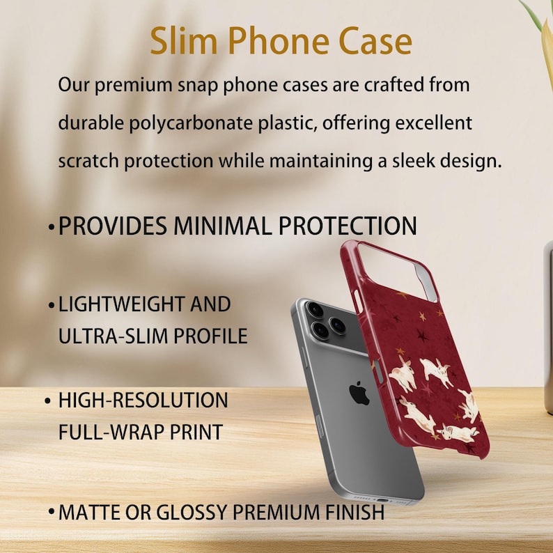 May include: A slim phone case with a red background and a white animal design. The case is shown on a silver phone. The text on the image reads "Slim Phone Case" and lists features like "Lightweight and Ultra-Slim Profile."