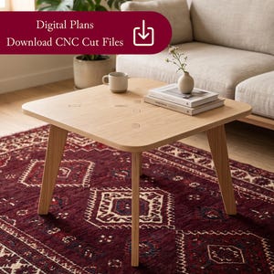 May include: A light wood square coffee table with angled legs. The table has a natural finish and sits on a patterned red rug. A small vase with flowers, books, and a mug are on the table. Text on the image reads "Digital Plans Download CNC Cut Files".