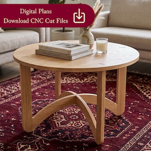 Puede incluir: Una mesa de centro redonda de madera clara. La mesa tiene un diseño de base único y está coronada con libros, una vela y un jarrón. El texto "Digital Plans Download CNC Cut Files" se muestra en una pancarta.