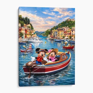 May include: A colorful canvas print depicting Mickey and Minnie Mouse in a red and blue motorboat on a sunny bay. The scene features a coastal village with multi-colored buildings, hills, and several other boats on the water under a blue sky.