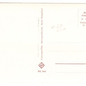 May include: A white ceramic mug with a black handle and the text "But First, Coffee" in a handwritten style. The mug is on a white surface. The mug is approximately 10 cm tall.