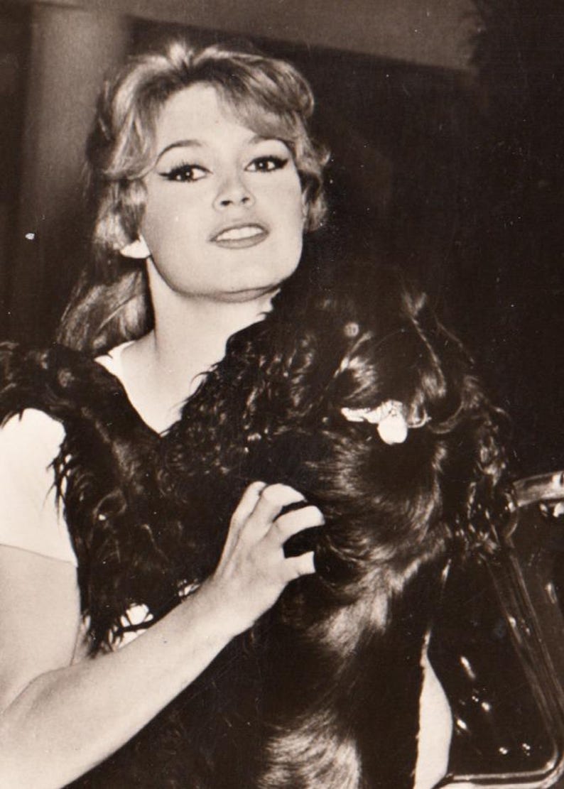 May include: A rectangular wooden sign, distressed for a rustic look, bearing the handwritten text "Welcome to our home". The sign is designed for indoor or outdoor use, with a simple, welcoming aesthetic.