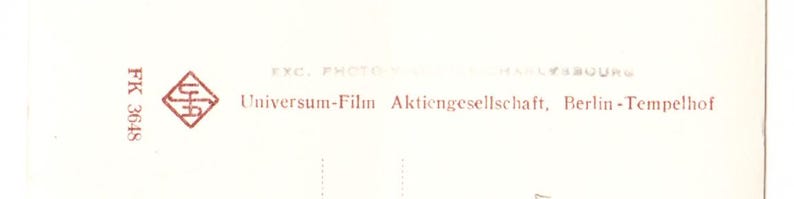 May include: A cream-coloured vintage postcard featuring text and a logo. The text reads "Universum-Film Aktiengesellschaft, Berlin-Tempelhof" and "FK 3648". The logo is a red diamond shape with a stylized design.