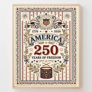 May include: Framed print celebrating 250 years of American freedom. The design features the word "AMERICA" above the number "250" and the phrase "YEARS OF FREEDOM." The artwork includes a drum, stars, and a shield, all in a patriotic color scheme.
