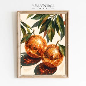 May include: A framed print depicting two orange disco ball-style fruits with green leaves and stems. The artwork has a vintage aesthetic, with a light background and a wooden frame. The text "PURE VINTAGE PRINTS" is at the top.