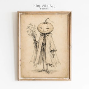 Op de afbeelding: Een ingelijste kunstdruk met een zwarte inktillustratie op verouderd papier. De tekening toont een figuur met een pompoenhoofd in een lange, zwierige mantel die een boeketje kleine bloemen vasthoudt. Bovenaan staat de tekst PURE VINTAGE PRINTS.