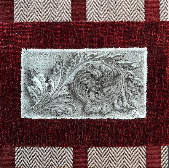 Drawing on antique fabric