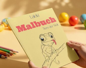May include: A yellow coloring book titled "Malbuch Tiere der Welt" with a cartoon lizard illustration. The book has pink text and is held by a person. Colored pencils and colorful balls are in the background.