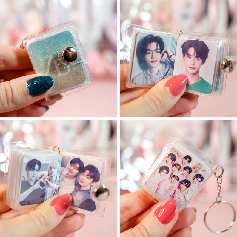 May include: Miniature clear plastic photo album keychains. The albums feature various images of people. One keychain has a teal and silver glitter design. Each album is held together with a silver metal clasp and attached to a silver keyring.