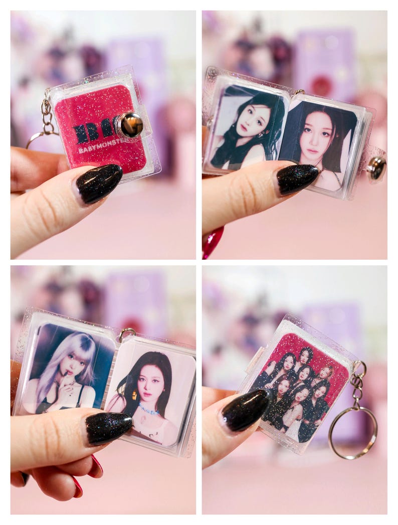 May include: A clear, glittery keychain featuring a small, open book design. The cover is red with the text "BABYMONSTER" and a button closure. Inside are photos of a group of women. The keychain is attached to a silver ring.